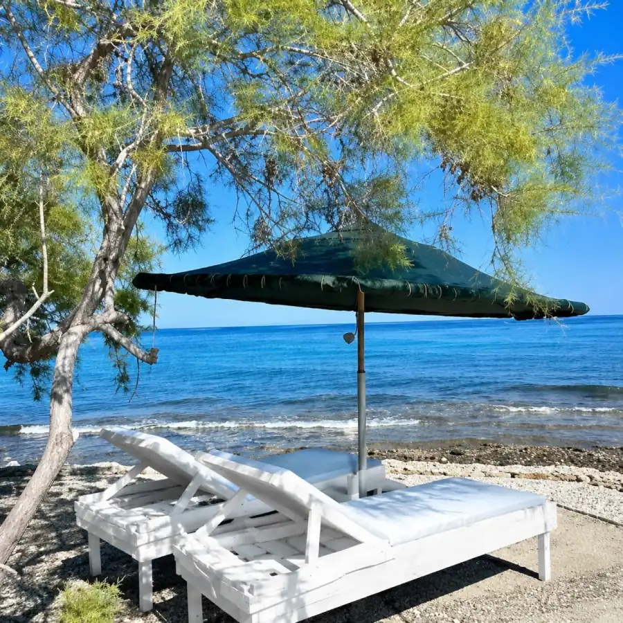 Private beach loungers by the sea