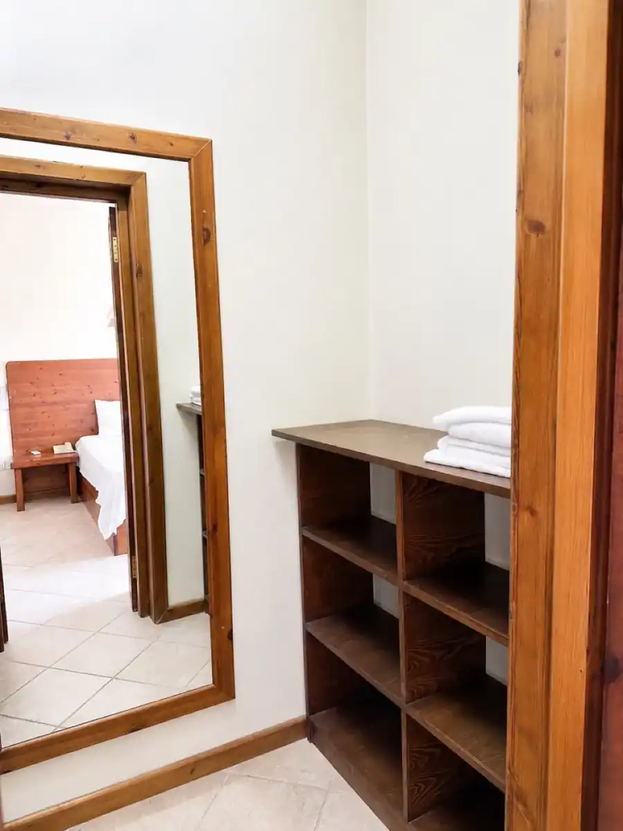 Garden View Hotel Room dressing area and shelves