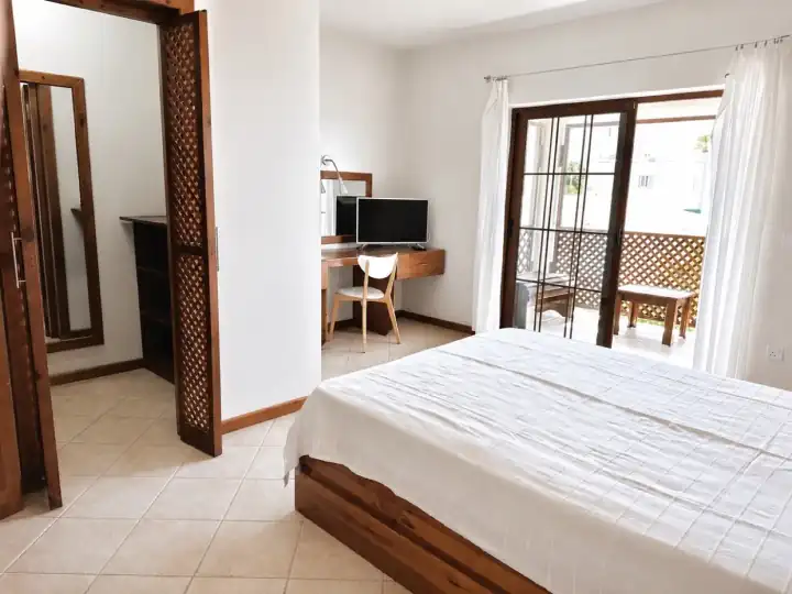 Full Sea View Hotel Room bedroom desk and balcony