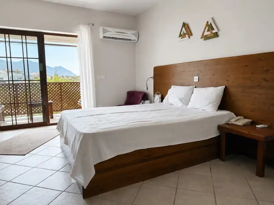 Full Sea View Hotel Room bedroom with mountain view