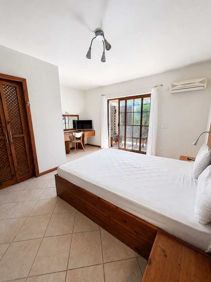 Partial Sea View Hotel Room bedroom and desk area